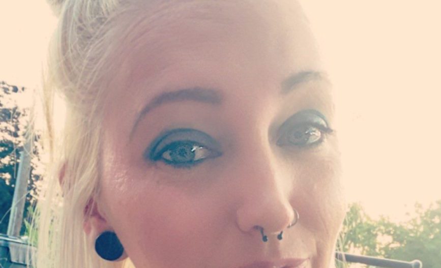 Headshot of Candi Havok, Client Team Manager