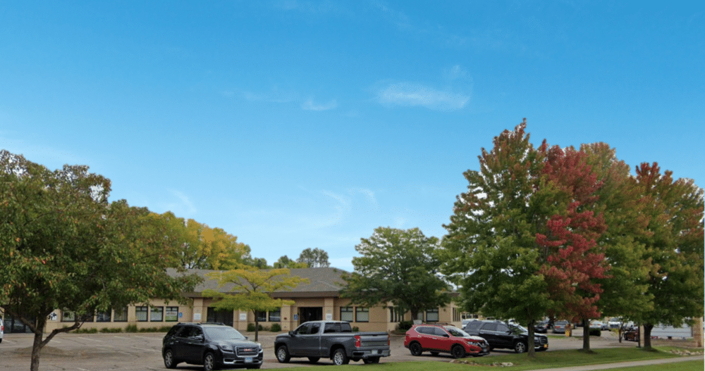An exterior image of a commercial office building in Coon Rapids, Minnesota where an Ellie Mental Health Therapy Clinic is located.