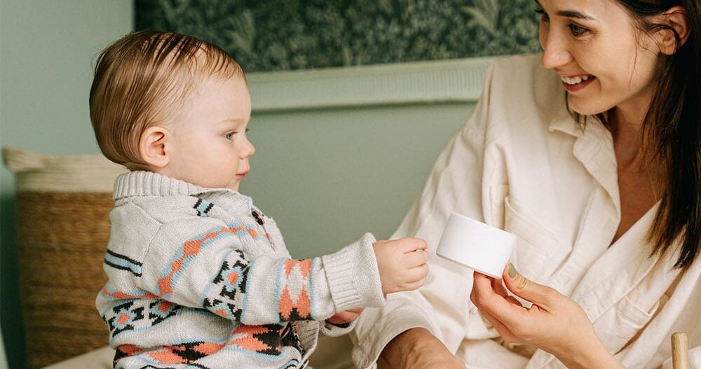 Mother caring for baby