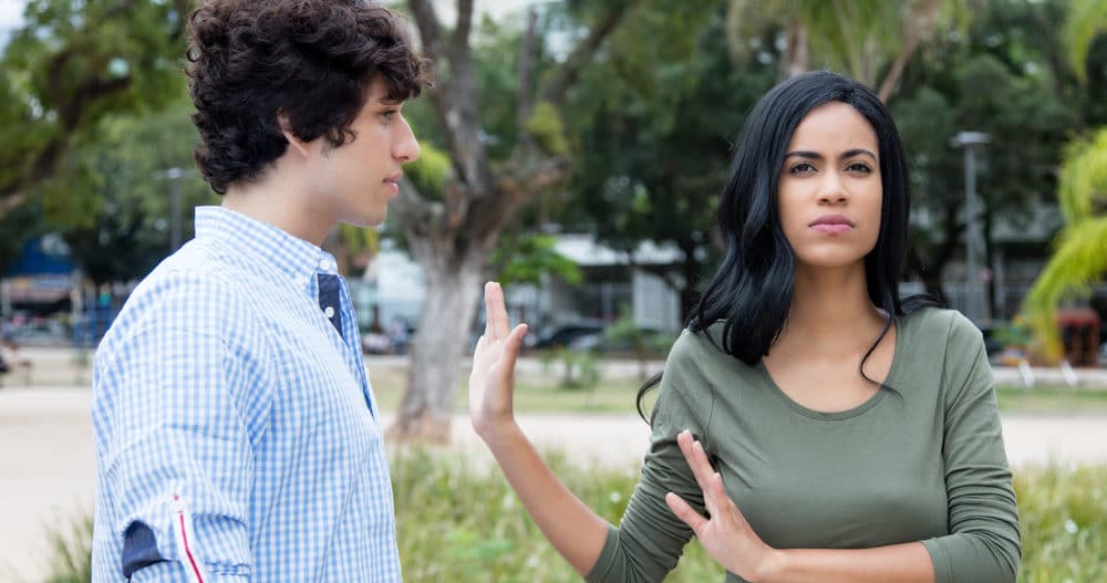 Man being rejected by woman in a relationship