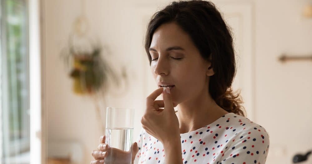 Woman taking psychiatric medications for her mental health