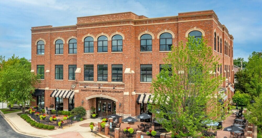 An exterior image of a commercial office building in downtown Palatine, Illinois where an Ellie Mental Health Therapy and Psychiatry Clinic is located.