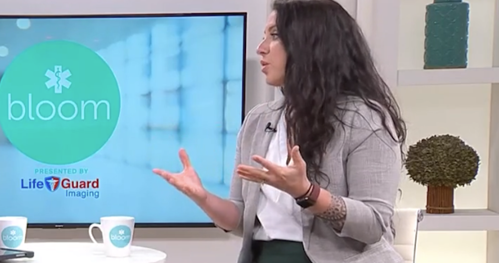 Katherine Planchard being interviewed by the local news in Florida